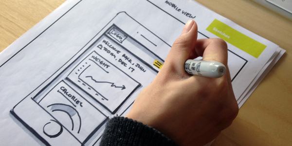 Photo of a designer sketching